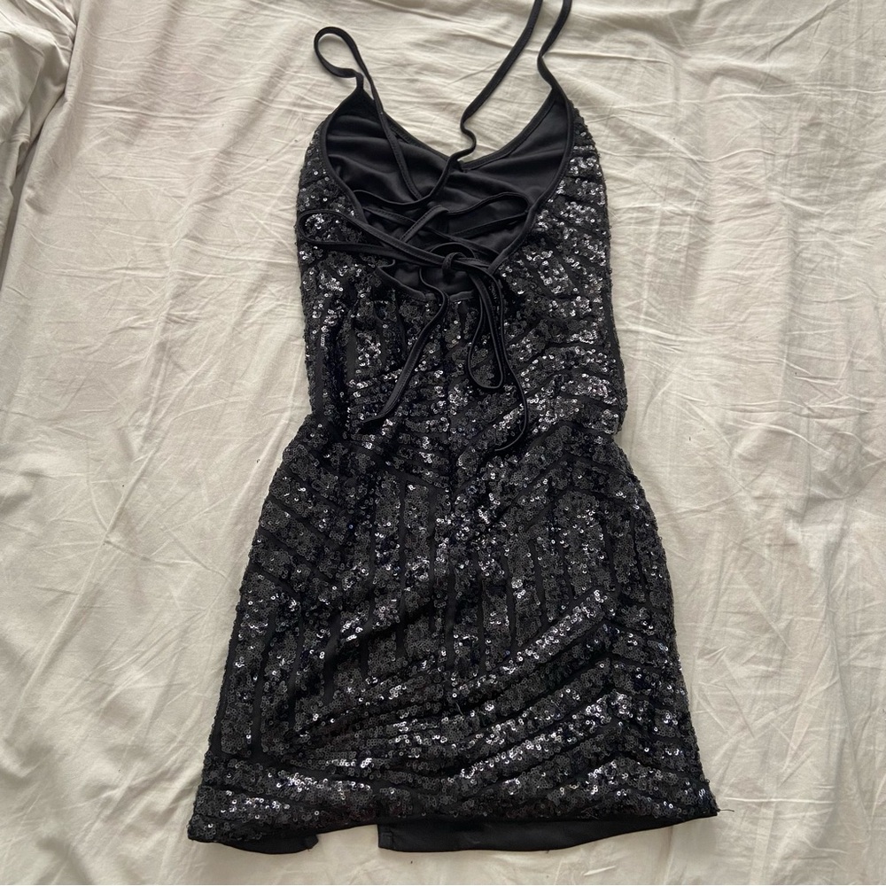 black sequin lace up back mini dress